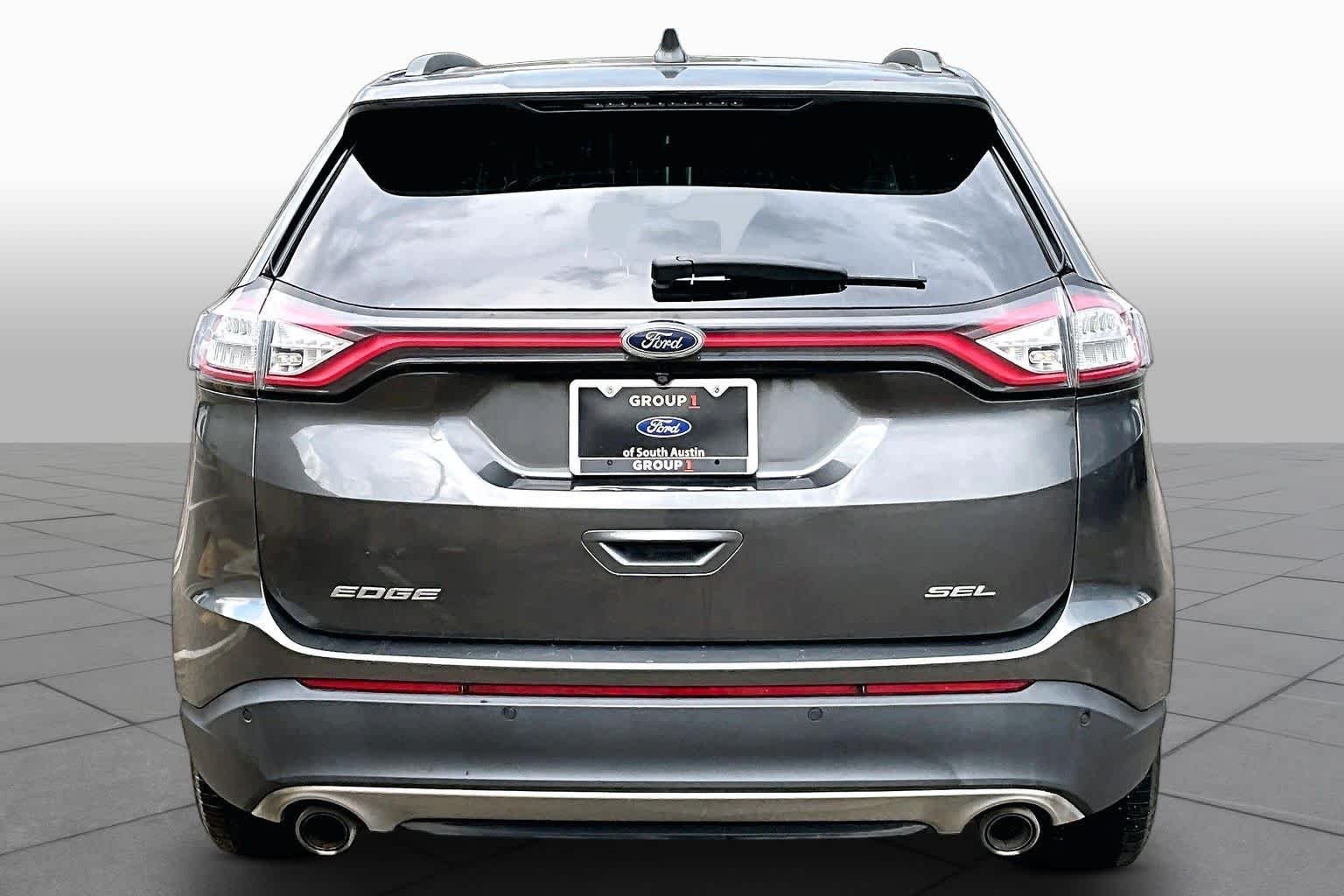 Used 2015 Magnetic Metallic Ford SEL image 7