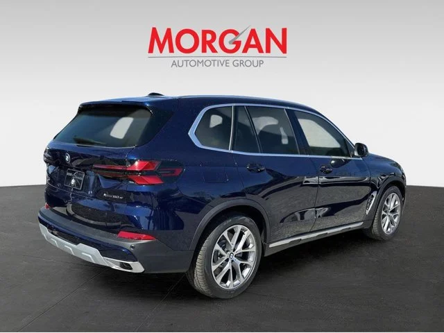 New 2026 Tanzanite Blue II Metallic BMW xDrive50e image 4