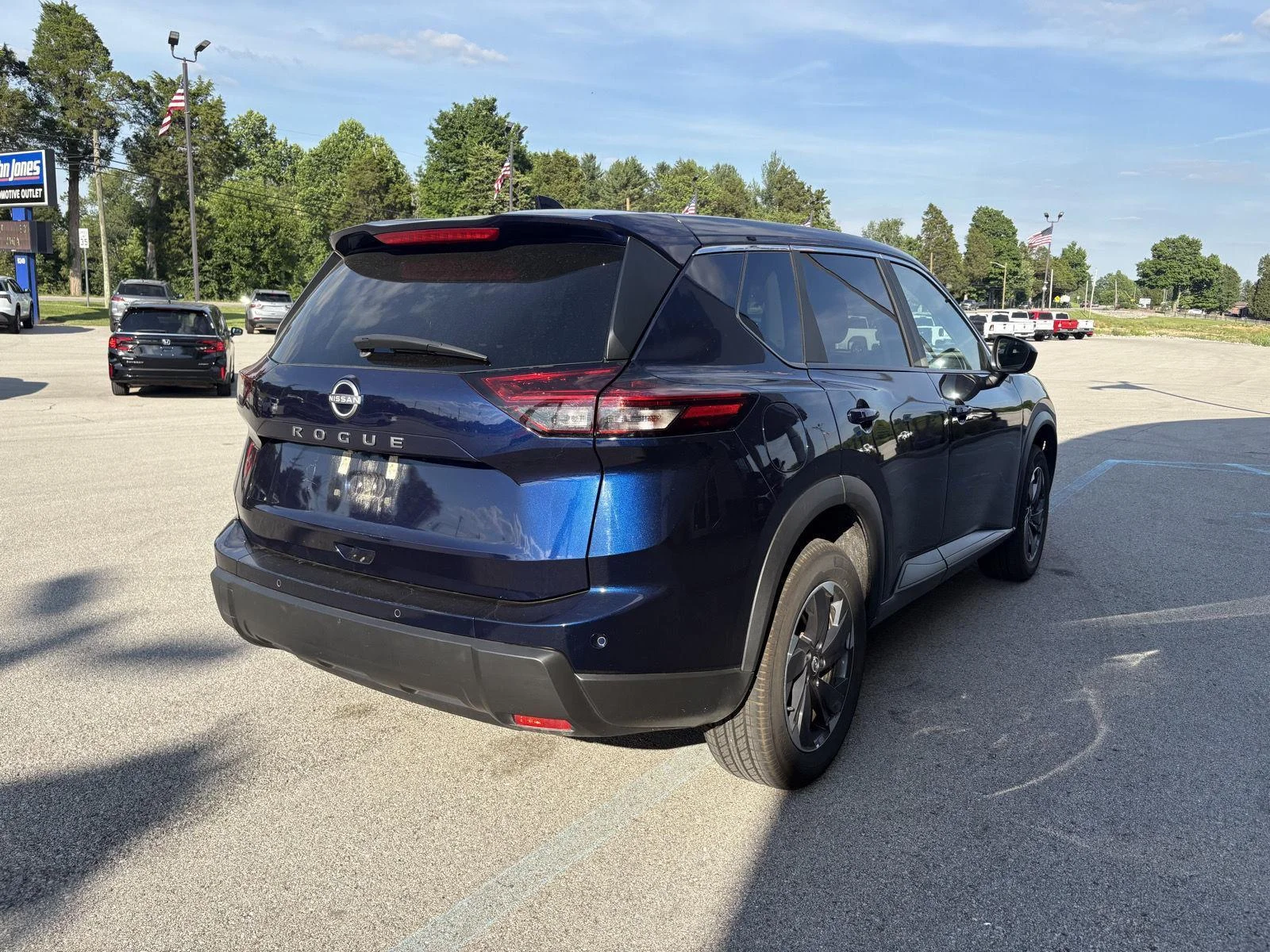 Used 2025 Deep Ocean Blue Pearl Nissan SV image 2