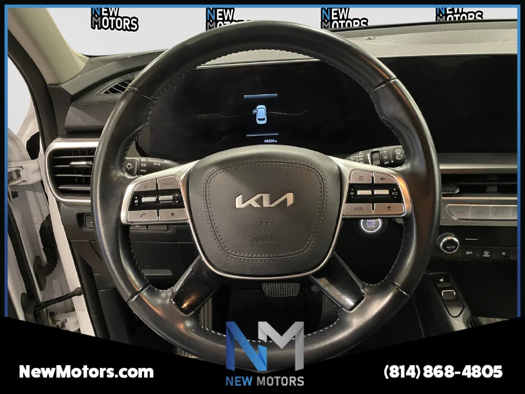 Used 2023 White Pearl Kia S image 12