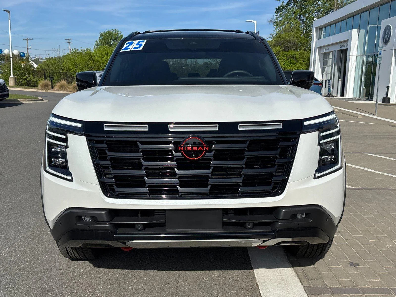 Used 2025 Aspen White Tricoat/Super Black Nissan PRO-4X image 8