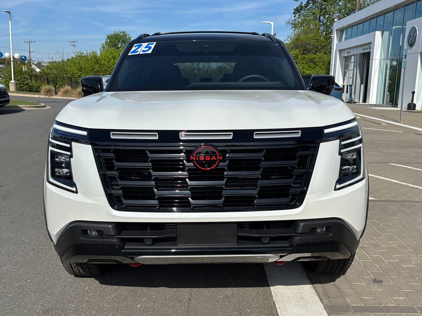 Used 2025 Aspen White Tricoat/Super Black Nissan PRO-4X image 8