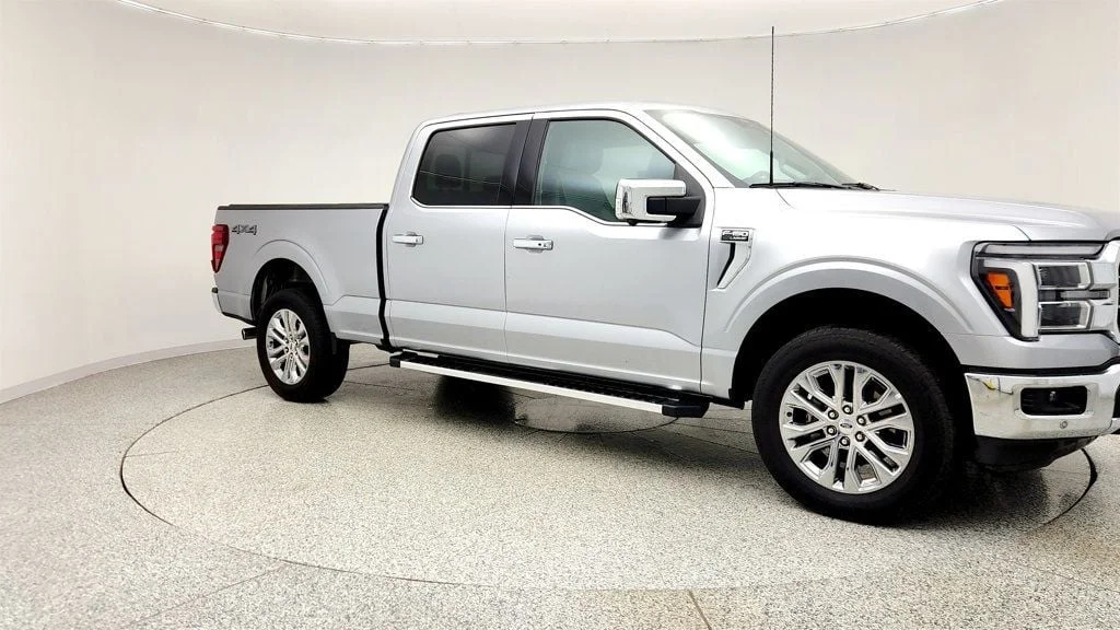 Used 2025 Iconic Silver Metallic Ford LARIAT 4WD SuperCrew 6.5