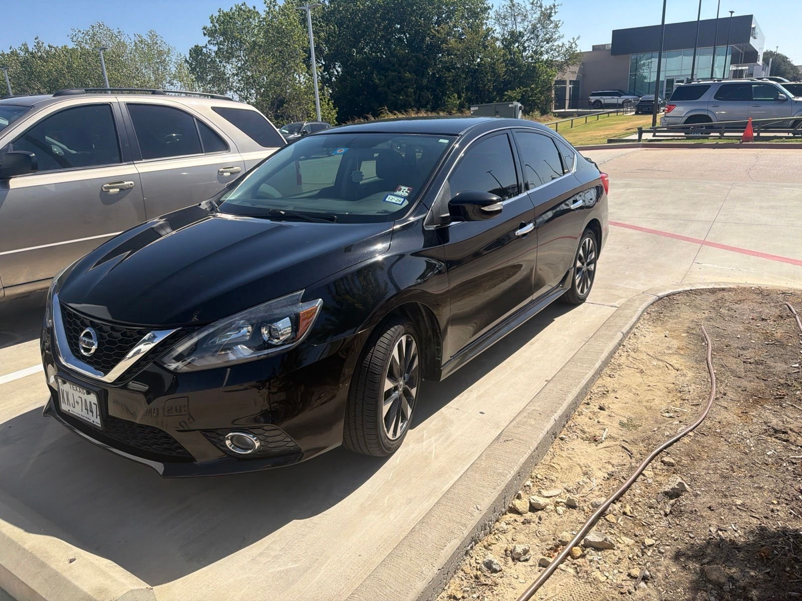 Used 2017 Super Black Nissan SR image 7