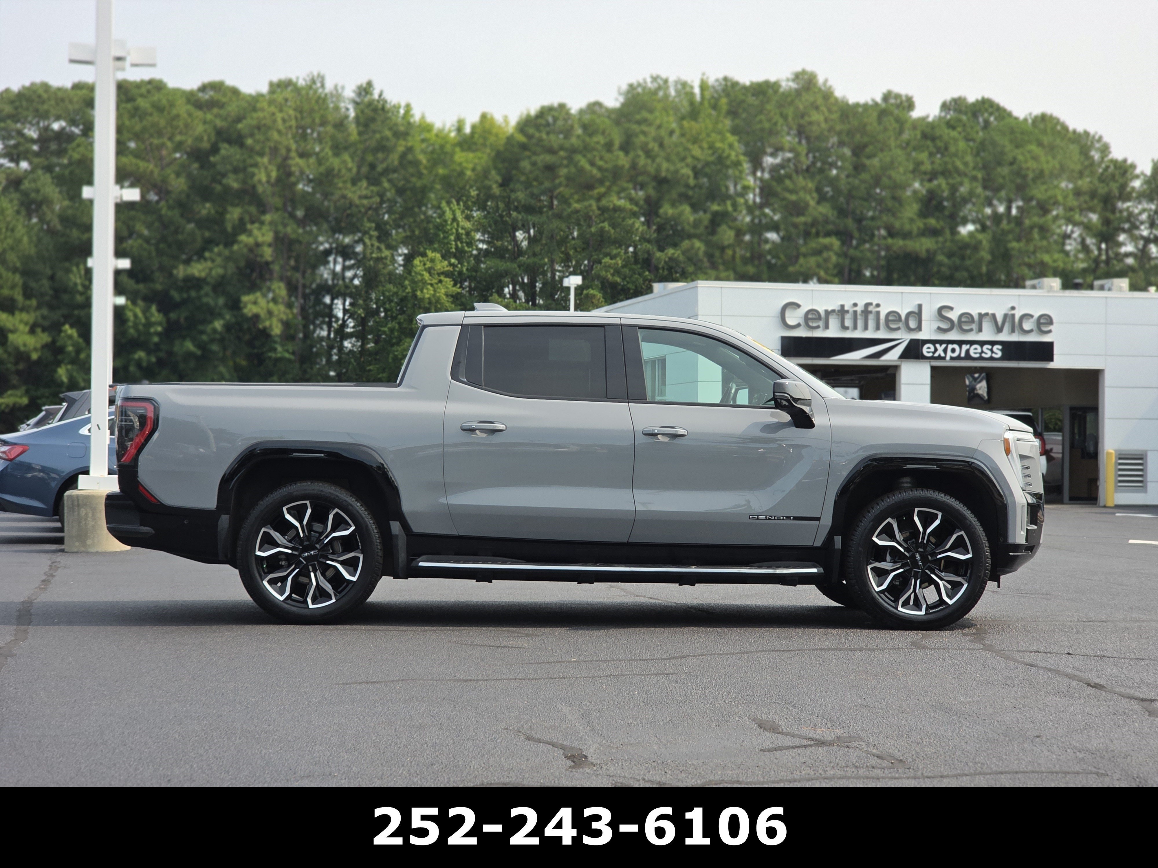 Used 2025 Thunderstorm Gray GMC Max Range Denali image 8