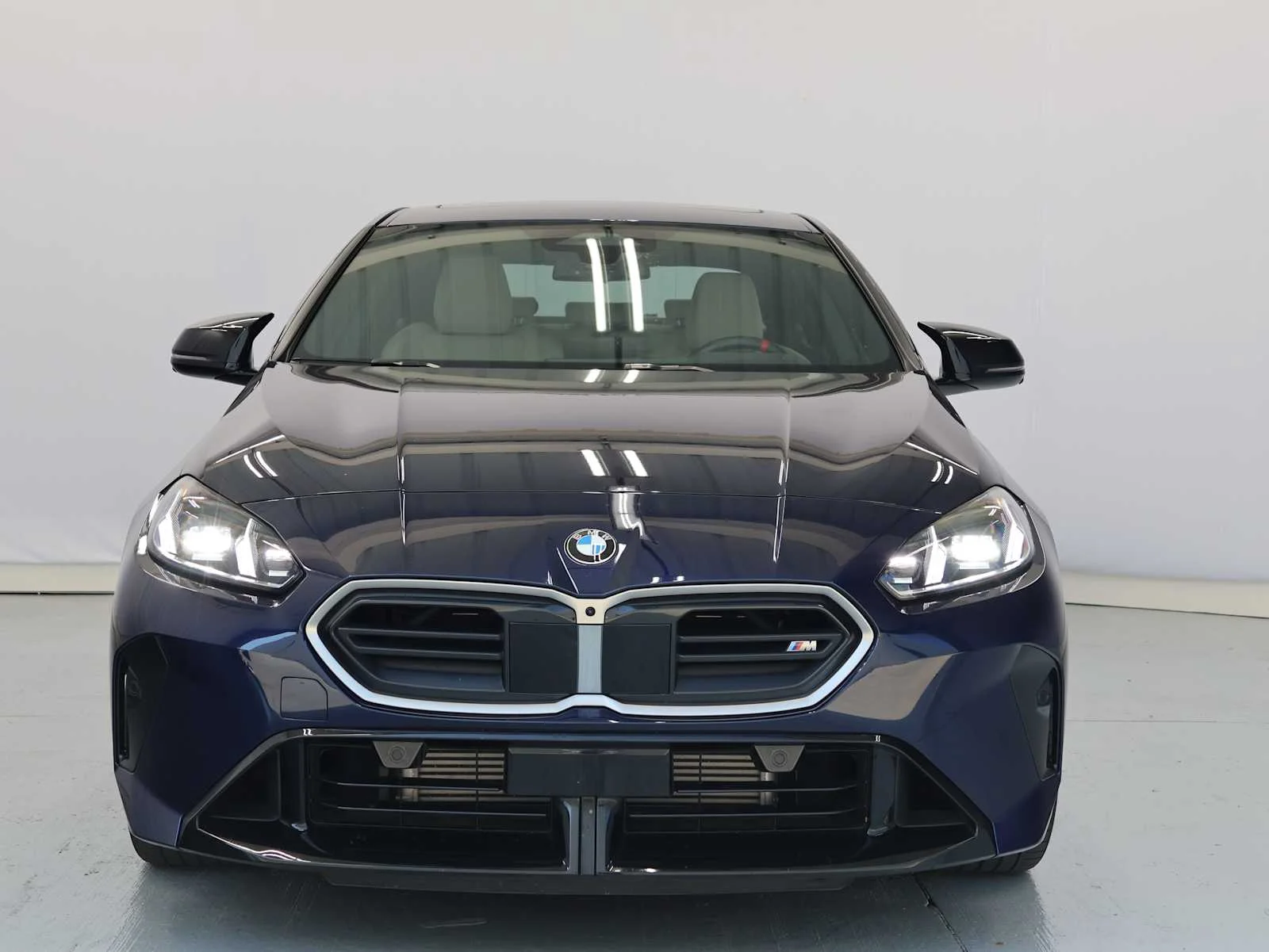 Certified Used 2025 Tanzanite Blue II Metallic BMW M235 xDrive image 2