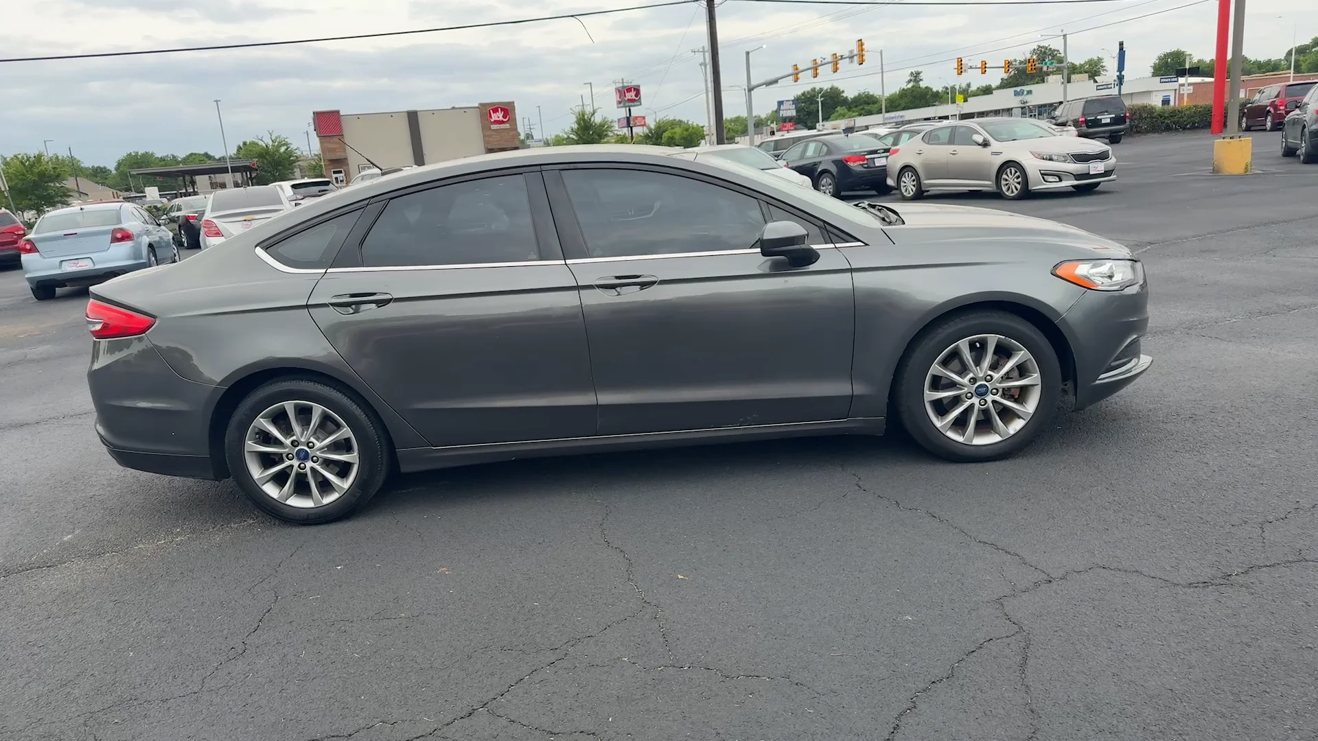 Used 2017 Gray Ford SE image 4