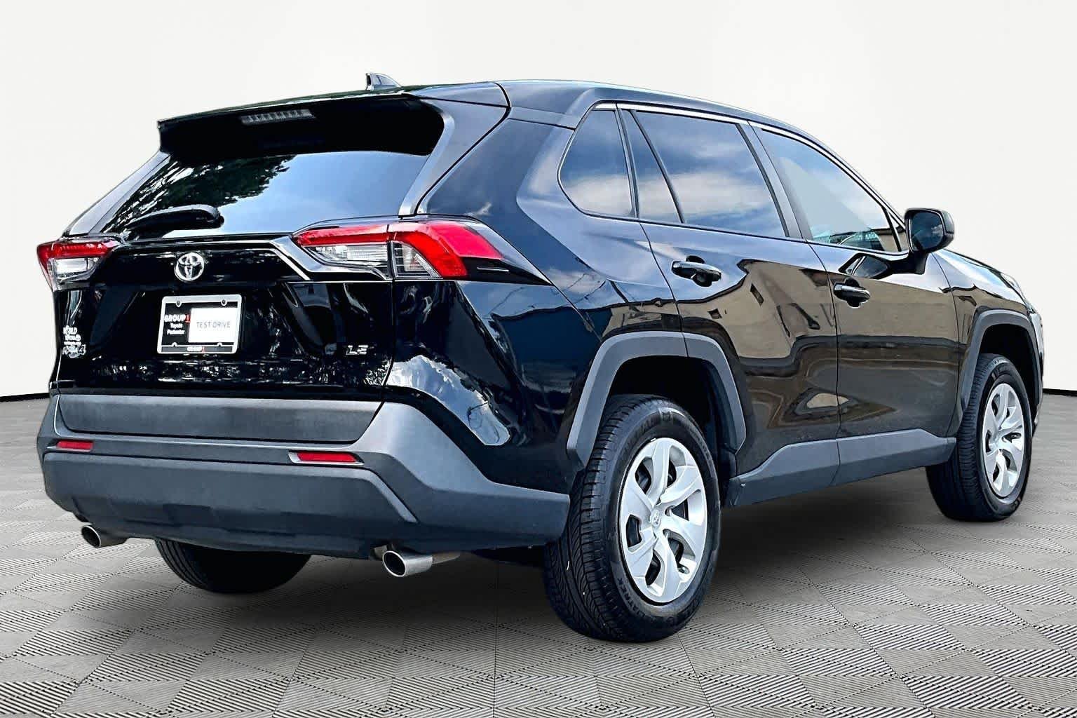 Used 2022 Midnight Black Metallic Toyota LE image 13