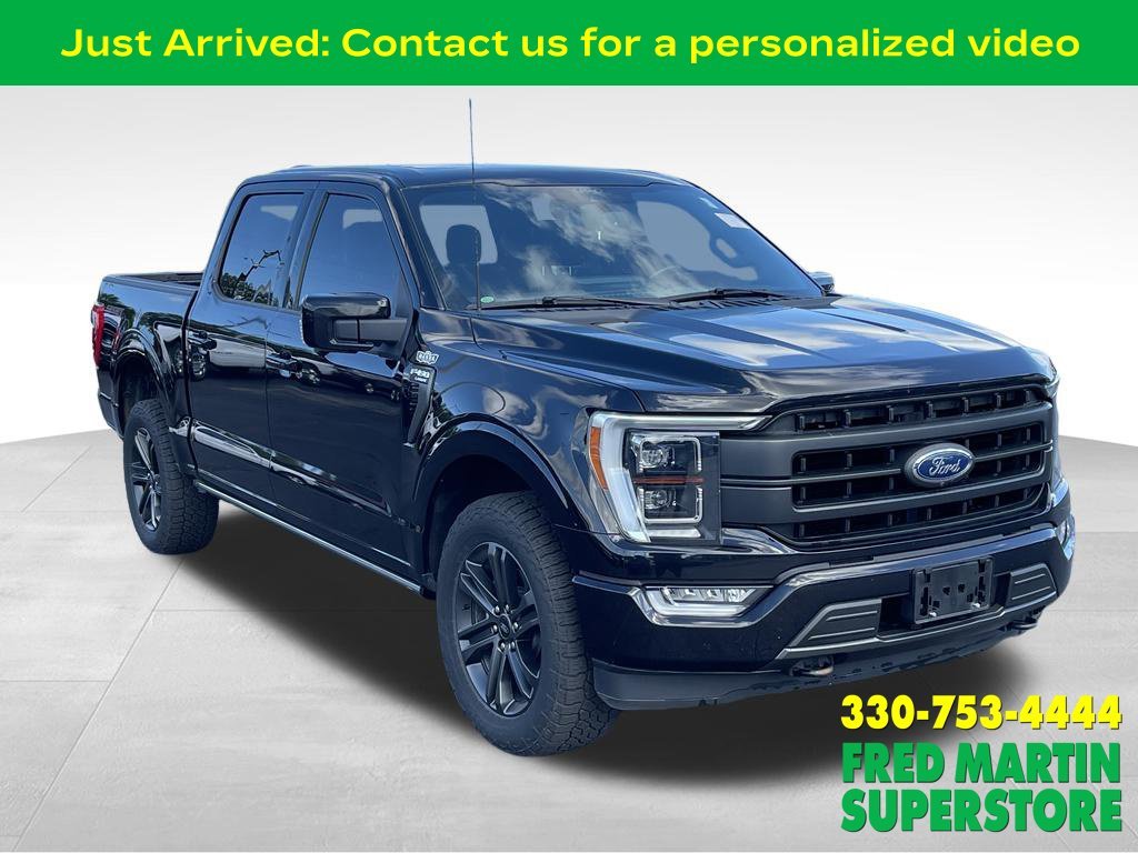 Used 2021 Agate Black Metallic Ford Lariat image 1