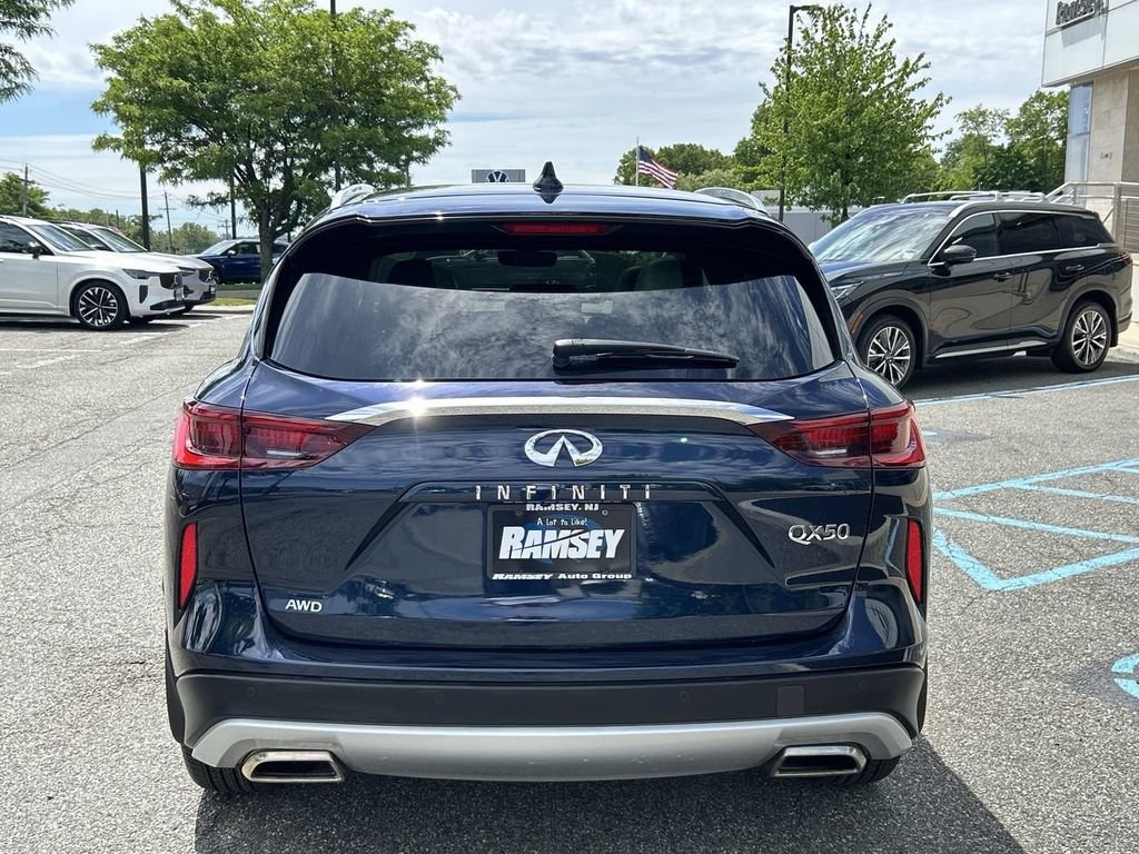 Certified Used 2023 Blue INFINITI LUXE image 26
