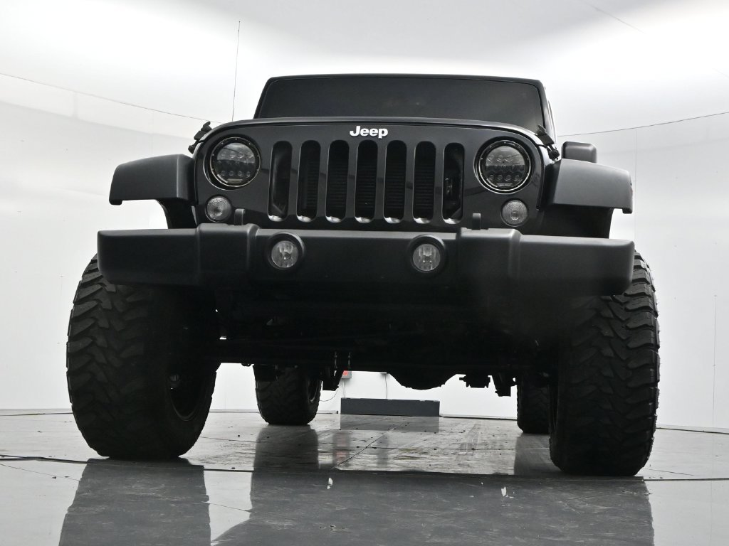 Used 2014 Black Clearcoat Jeep Unlimited Sport image 46
