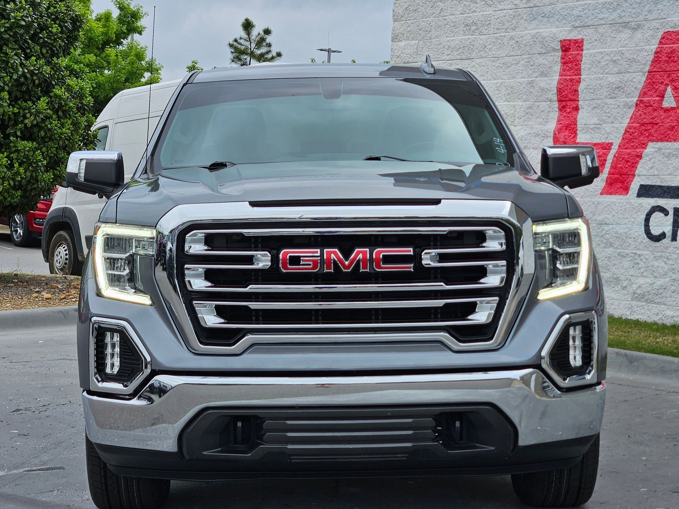 Used 2021 GMC Sierra 1500 SLT with VIN 3GTU9DED9MG436857 for sale in Little Rock