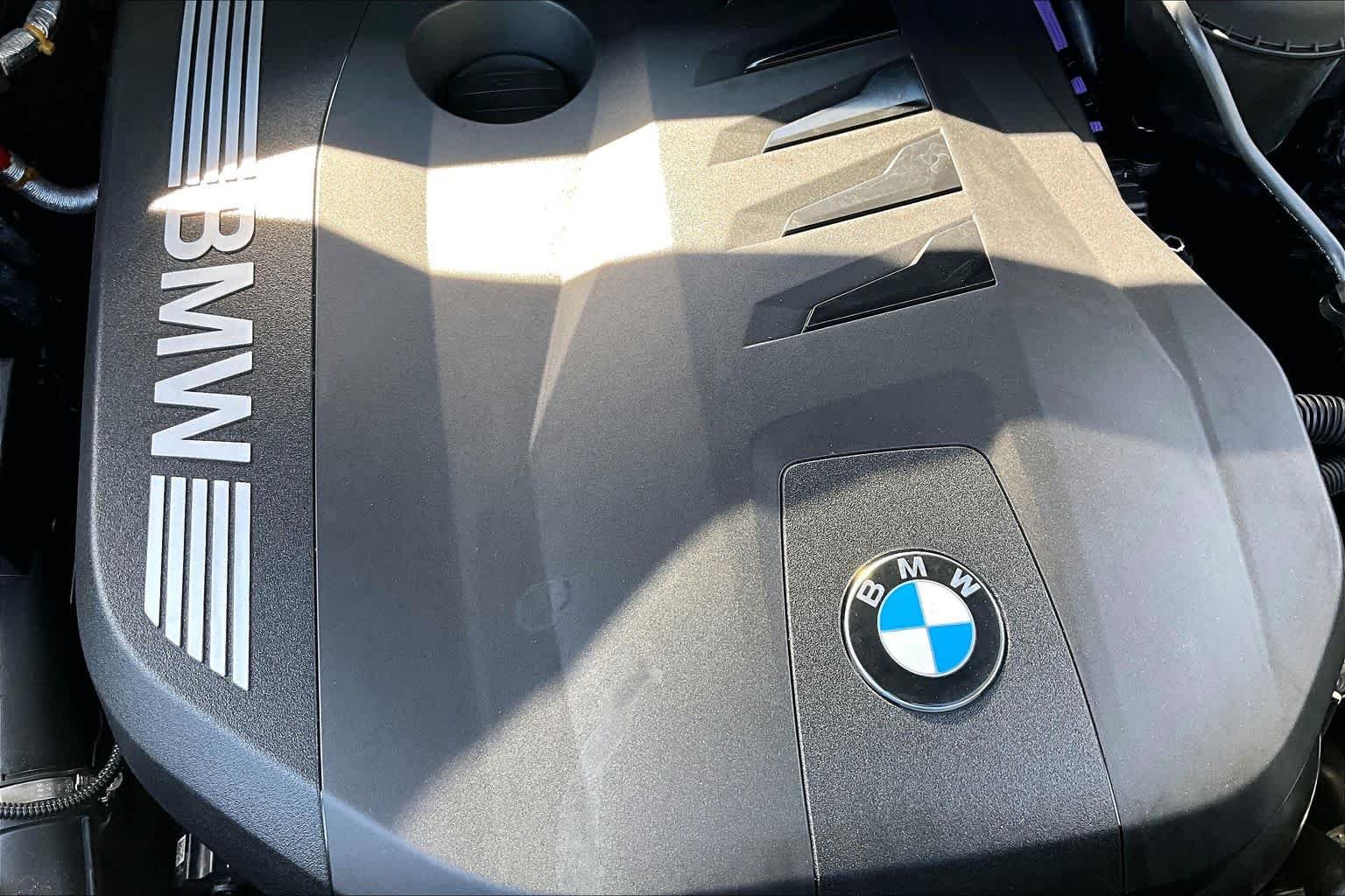 Certified Used 2024 Black Sapphire Metallic BMW sDrive40i image 34