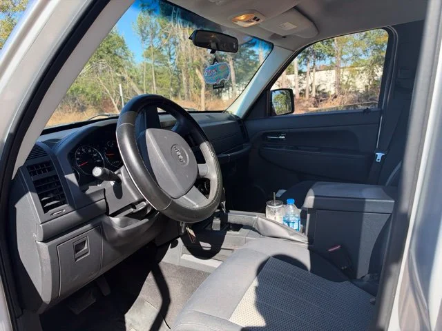 Used 2010 Silver Jeep Sport image 9