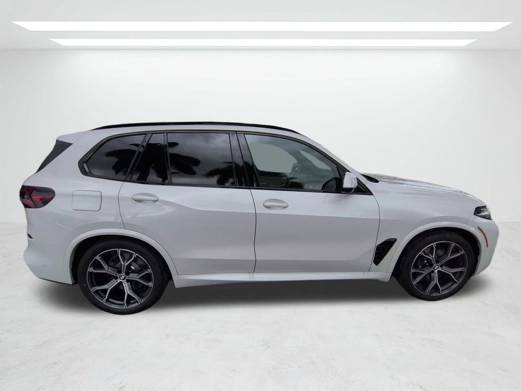 New 2026 Mineral White Metallic BMW xDrive50e image 3