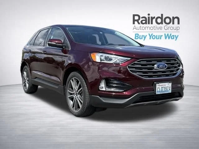 Used 2021 Burgundy Velvet Metallic Tinted Clearcoat Ford Titanium image 1