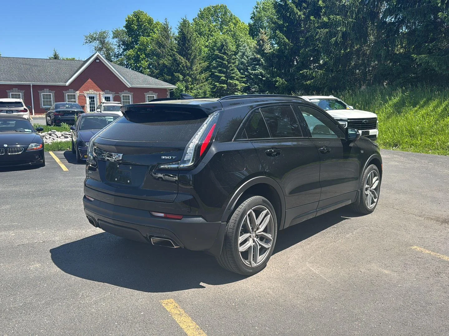 Used 2022 Stellar Black Metallic Cadillac AWD Sport image 3