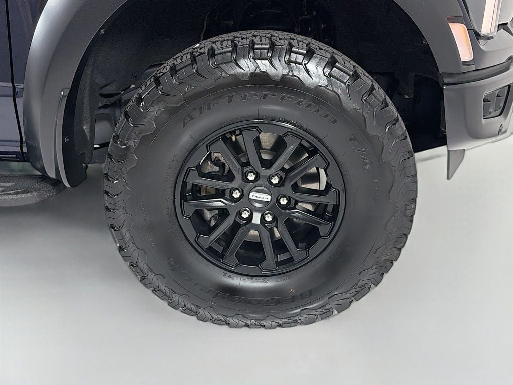Used 2024 Antimatter Blue Metallic Ford Raptor 4WD SuperCrew 5.5