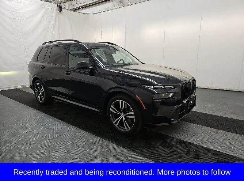 Used 2024 Black BMW xDrive40i image 1