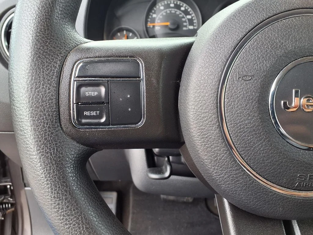 Used 2014 Gray Jeep Sport image 9