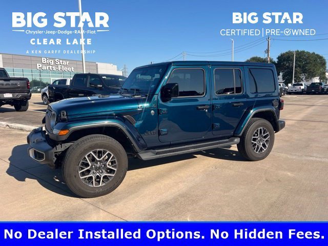 Used 2025 Fathom Blue Pearlcoat Jeep Sahara image 1