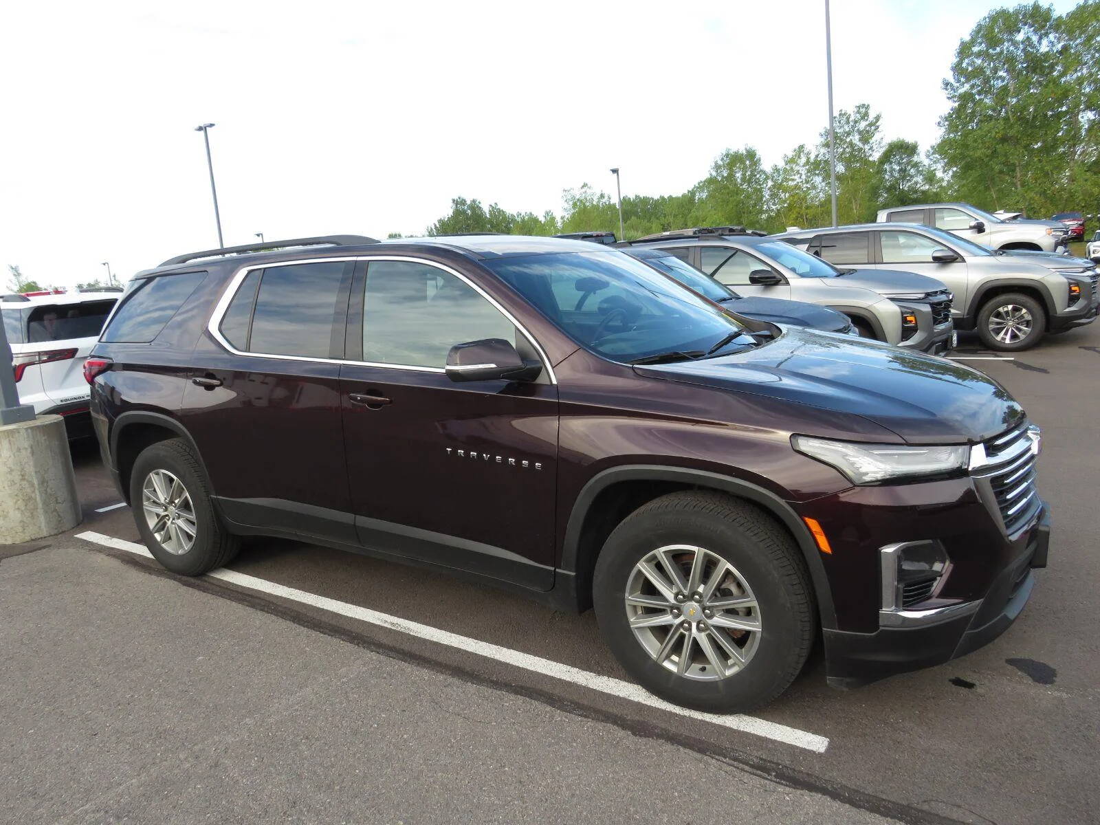 Used 2023 BLACK CHERRY METALLIC Chevrolet LT Cloth image 3