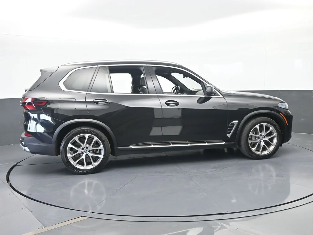 Used 2025 Black Sapphire Metallic BMW xDrive50e image 7
