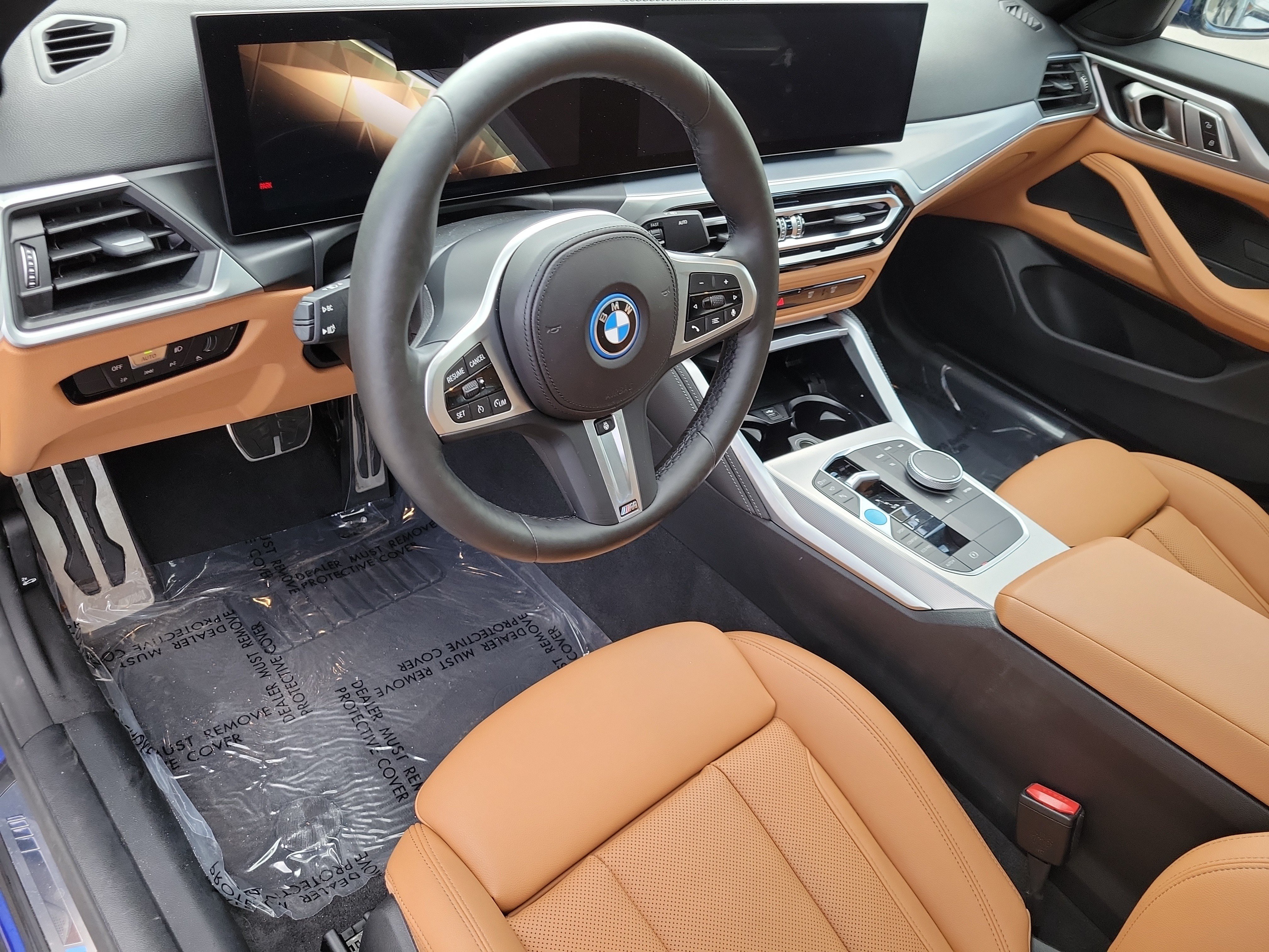Certified Used 2024 Portimao Blue Metallic BMW eDrive40 image 14