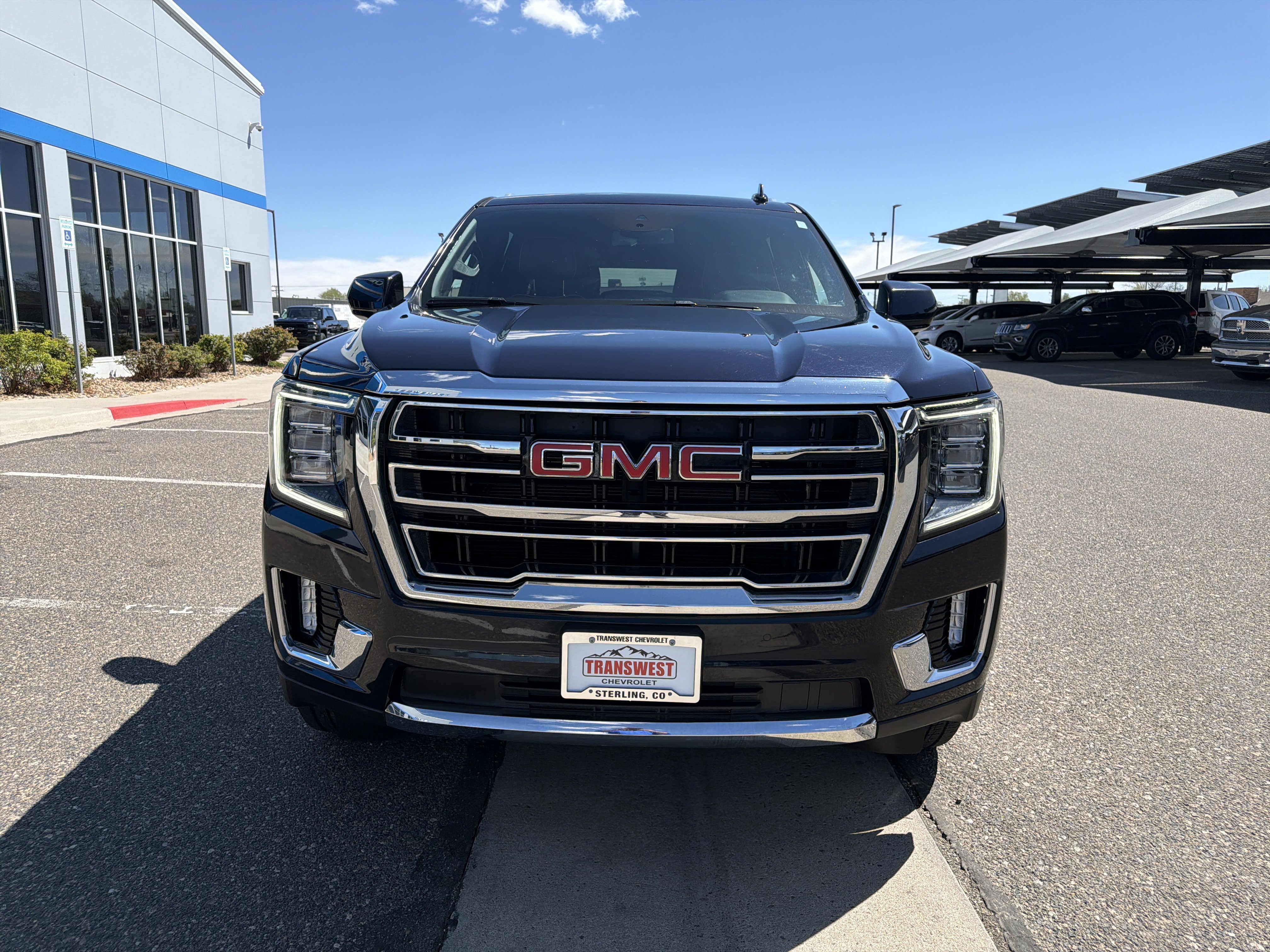 Used 2024 Midnight Blue Metallic GMC SLT image 8