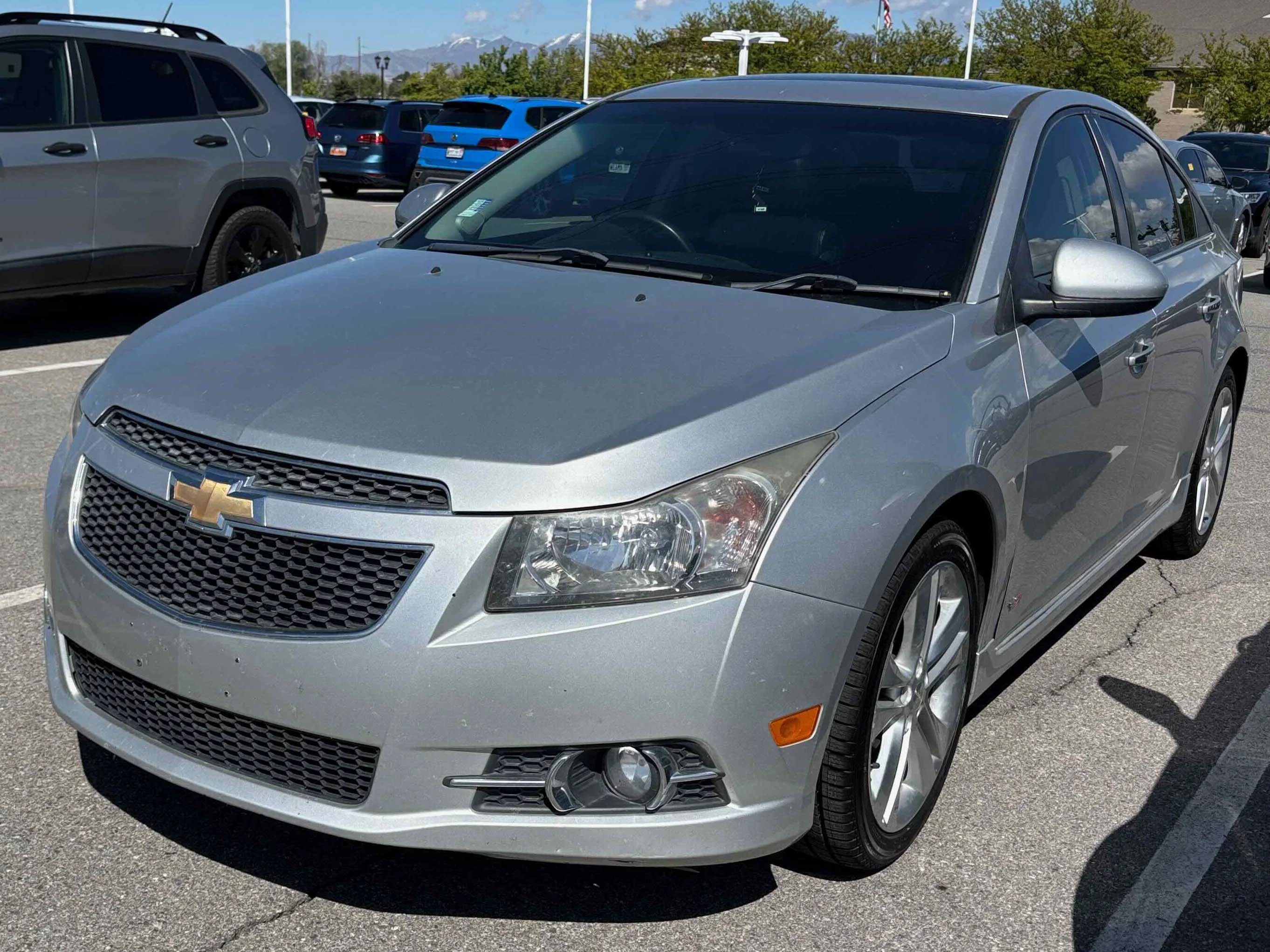 Used 2014 Silver Ice Metallic Chevrolet LTZ image 1