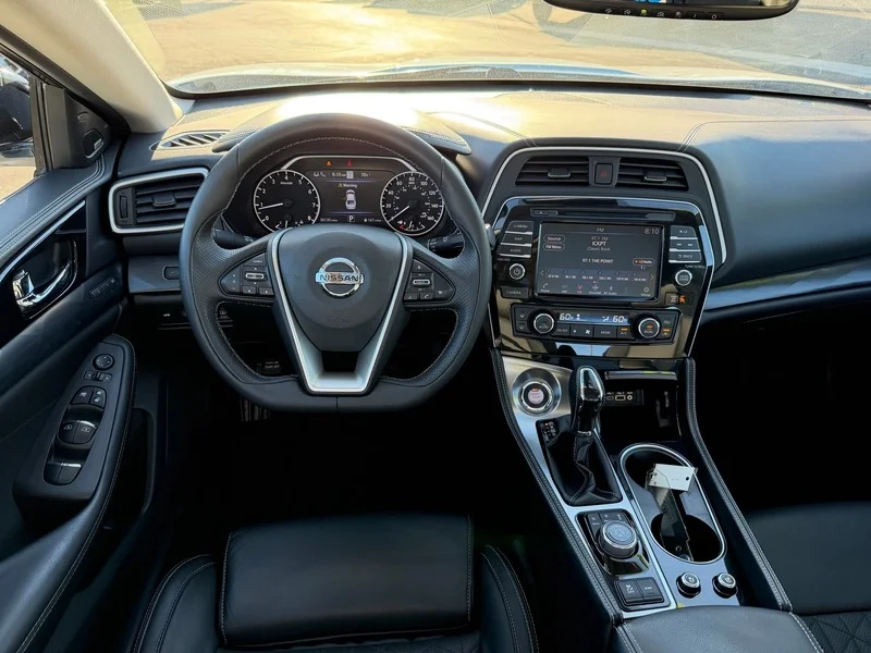 Used 2019 Pearl White Trico Nissan Platinum image 12