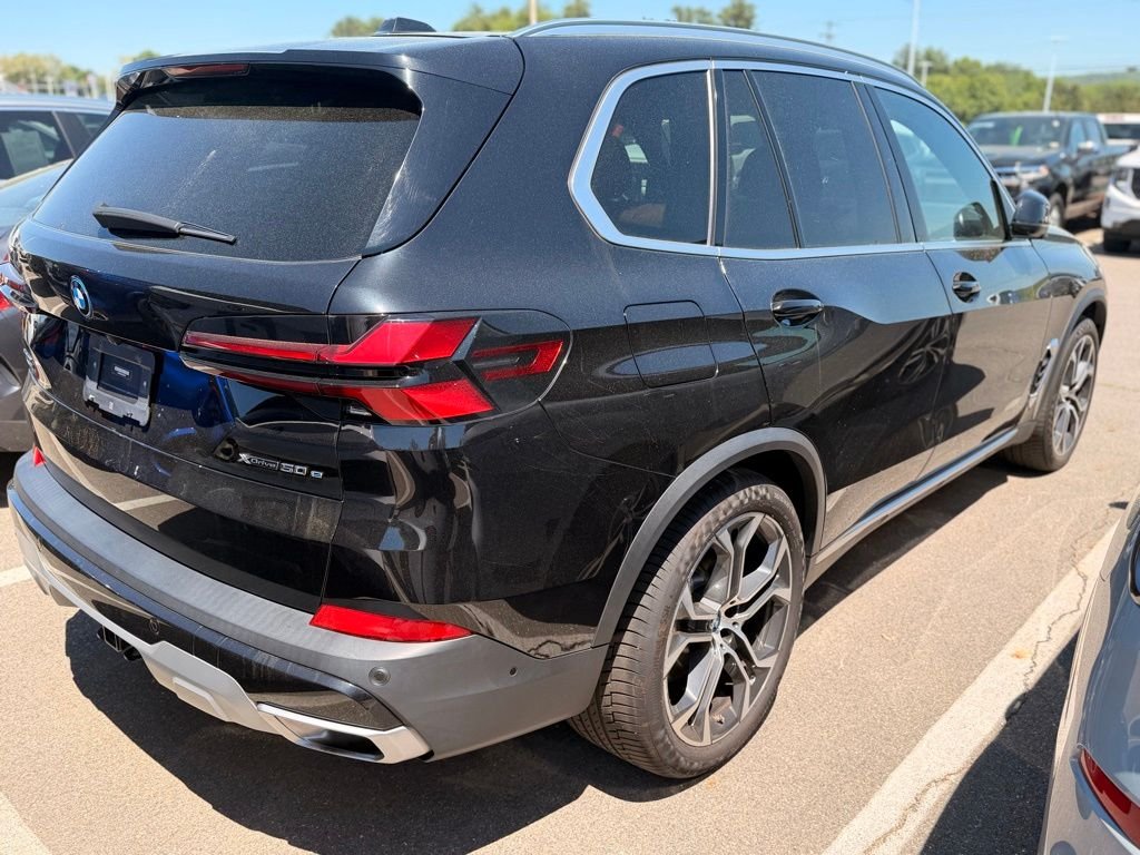 Certified Used 2024 Black Sapphire Metallic BMW xDrive50e image 4