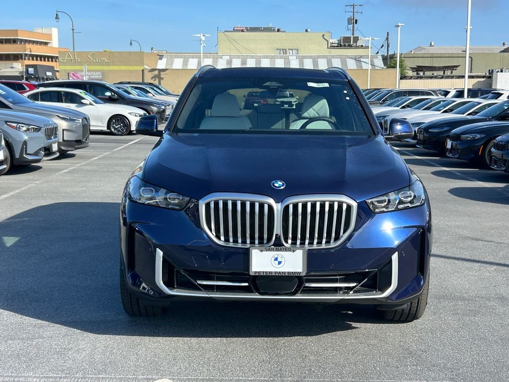 New 2026 Tanzanite Blue II Metallic BMW xDrive50e image 8