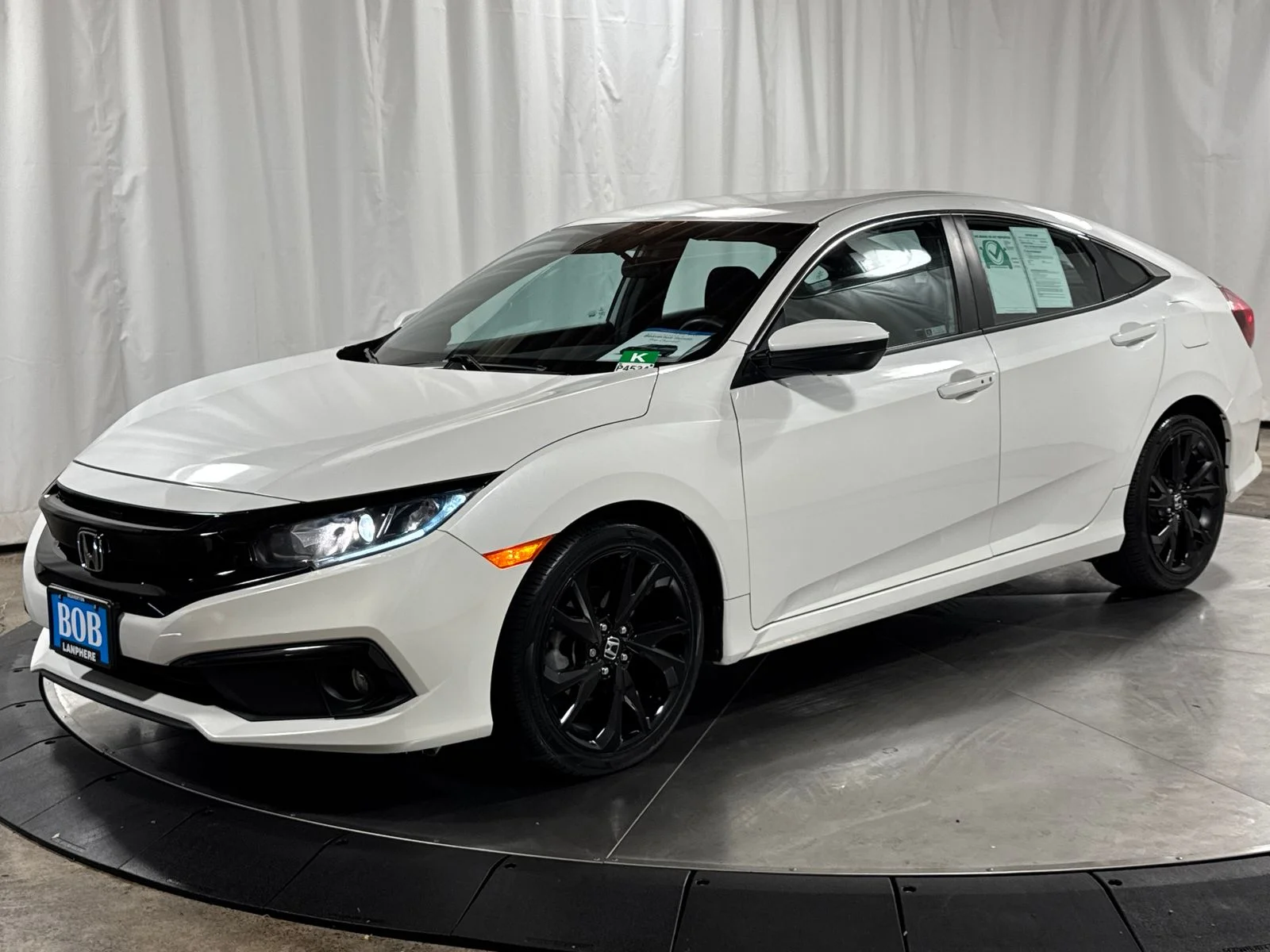 Used 2019 White Orchid Pearl Honda Sport image 1