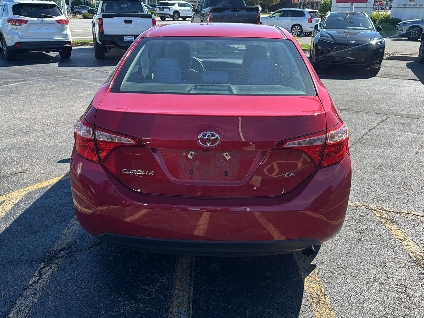 Used 2018 Barcelona Red Metallic Toyota LE image 5