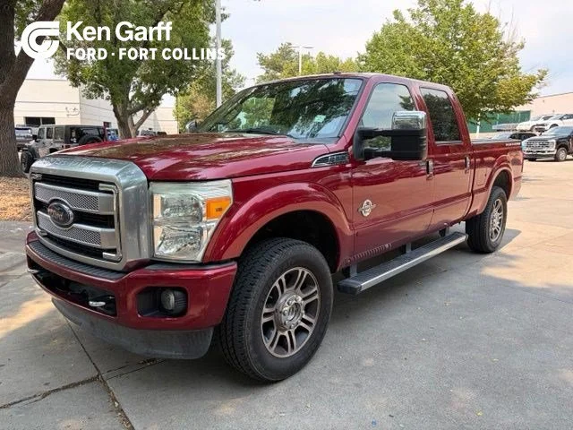 Used 2016 Ruby Red Metallic Ford Platinum image 1