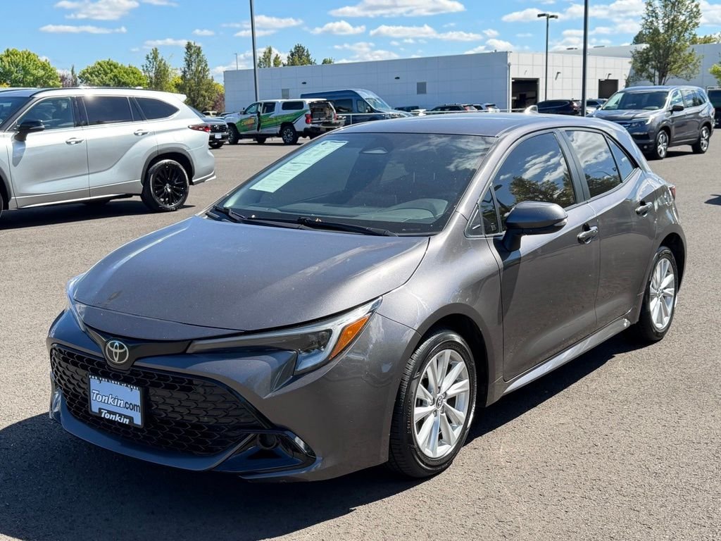 Used 2023 Magnetic Gray Metallic Toyota SE image 4