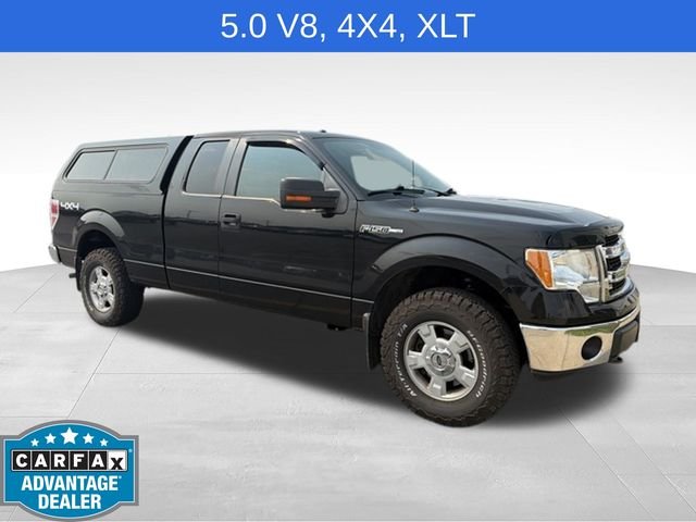 Used 2013 Black Ford XLT image 1