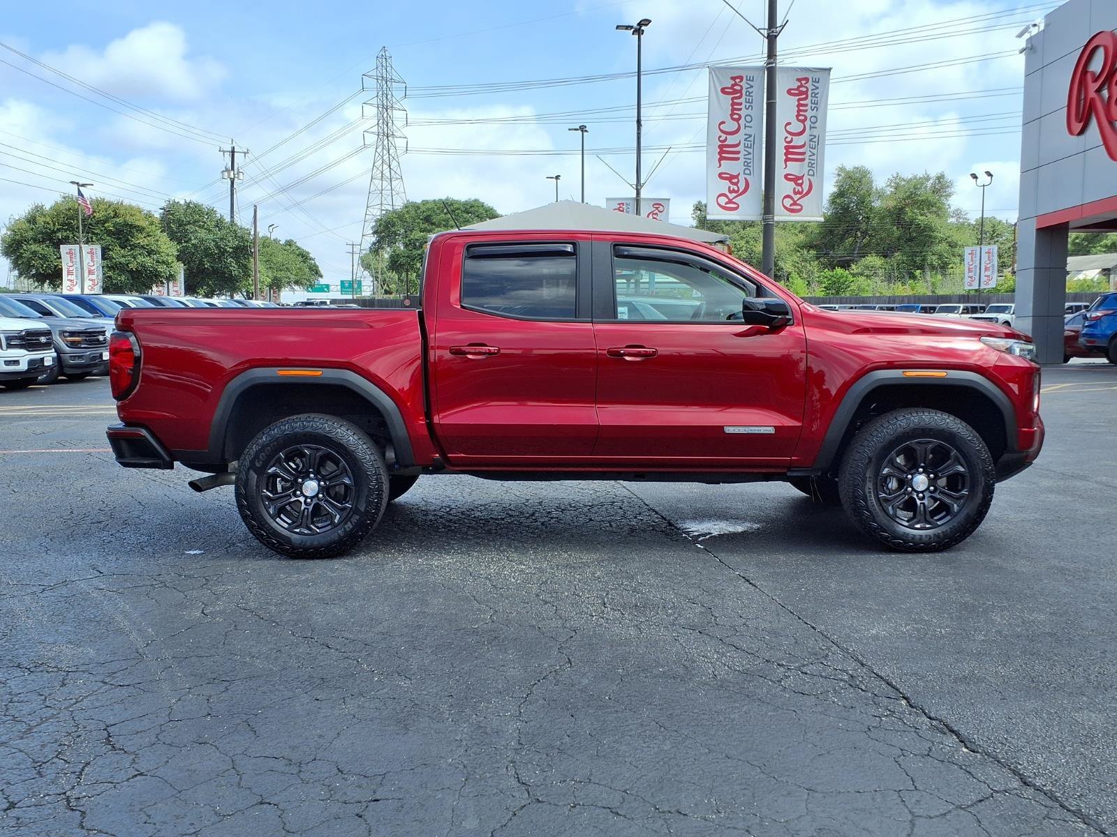 Used 2024 Volcanic Red Tintcoat GMC 2WD Elevation image 4