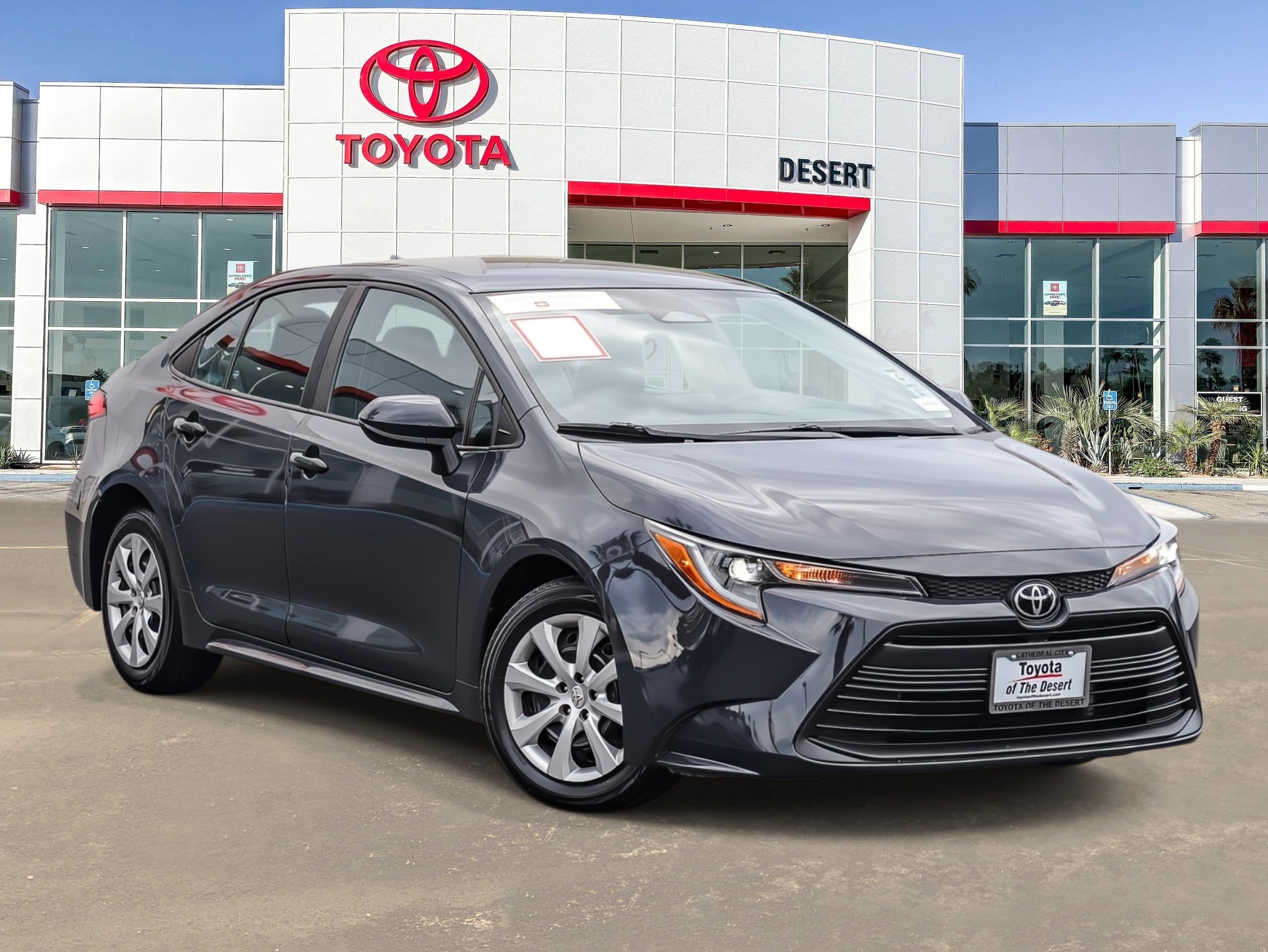 Used 2024 Underground/Midnight Black Metallic Toyota LE image 1