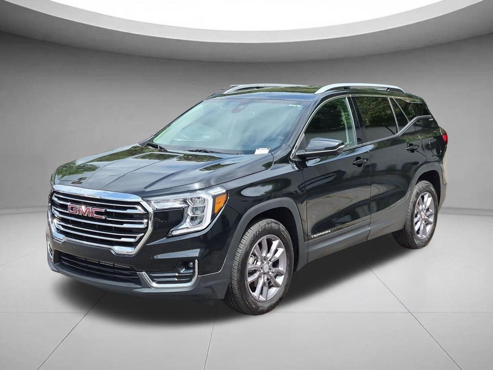 Used 2023 Ebony Twilight Metallic GMC SLT image 1