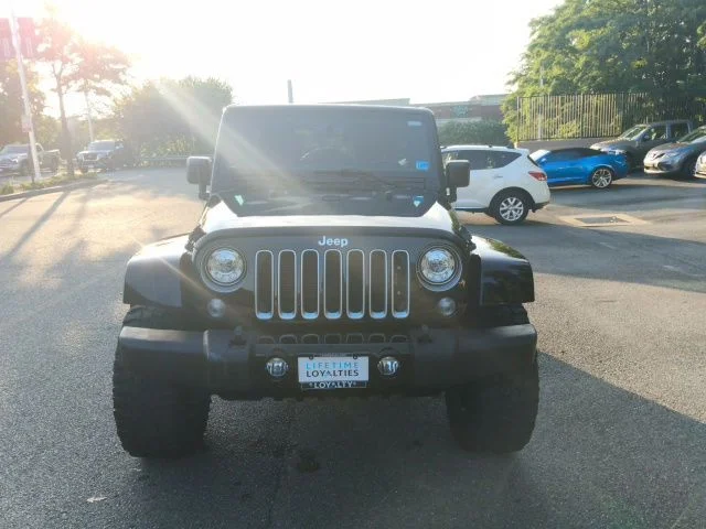 Used 2018 Black Jeep Unlimited Sahara image 1