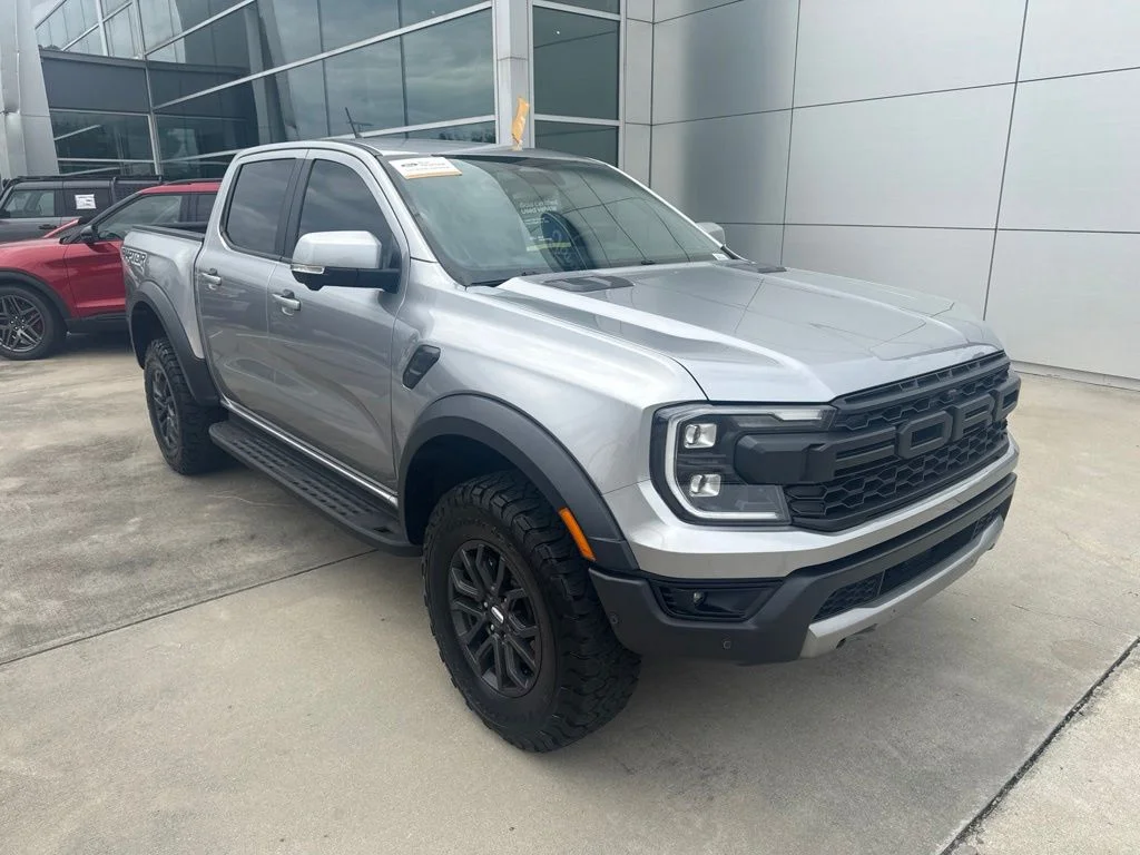 Certified Used 2024 Iconic Silver Metallic Ford Raptor image 1