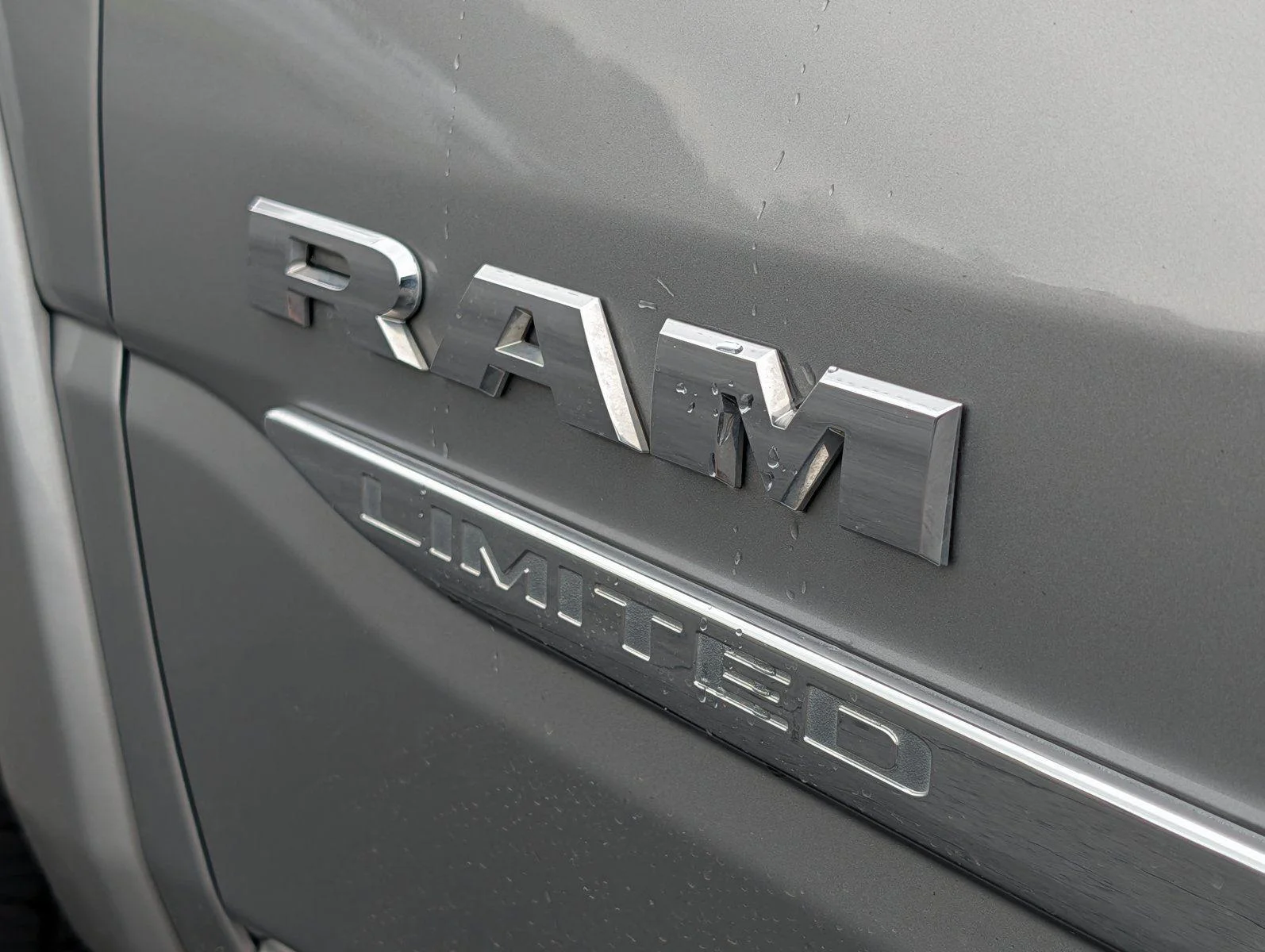 Used 2022 Billet Silver Metallic Clearcoat Ram Limited image 34