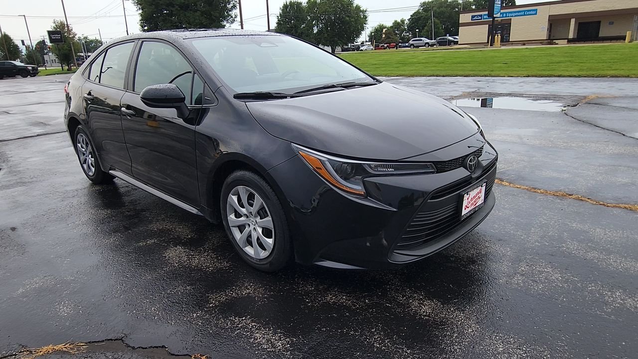 Used 2025 Midnight Black Metallic Toyota LE image 2
