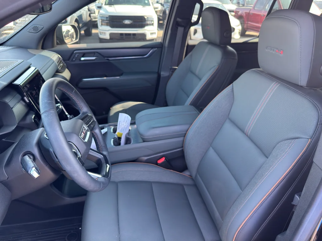Used 2024 Ebony Twilight Metallic GMC AWD AT4 image 13