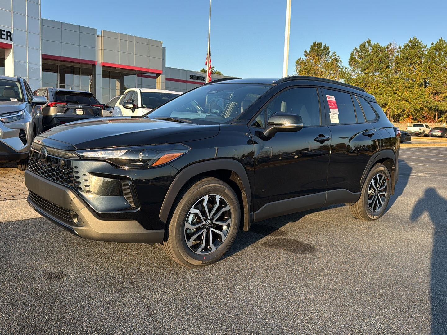 New 2026 Jet Black Toyota Hybrid SE image 2