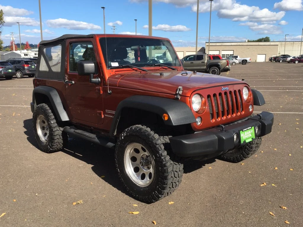 Used 2014 Orange Jeep Sport image 8
