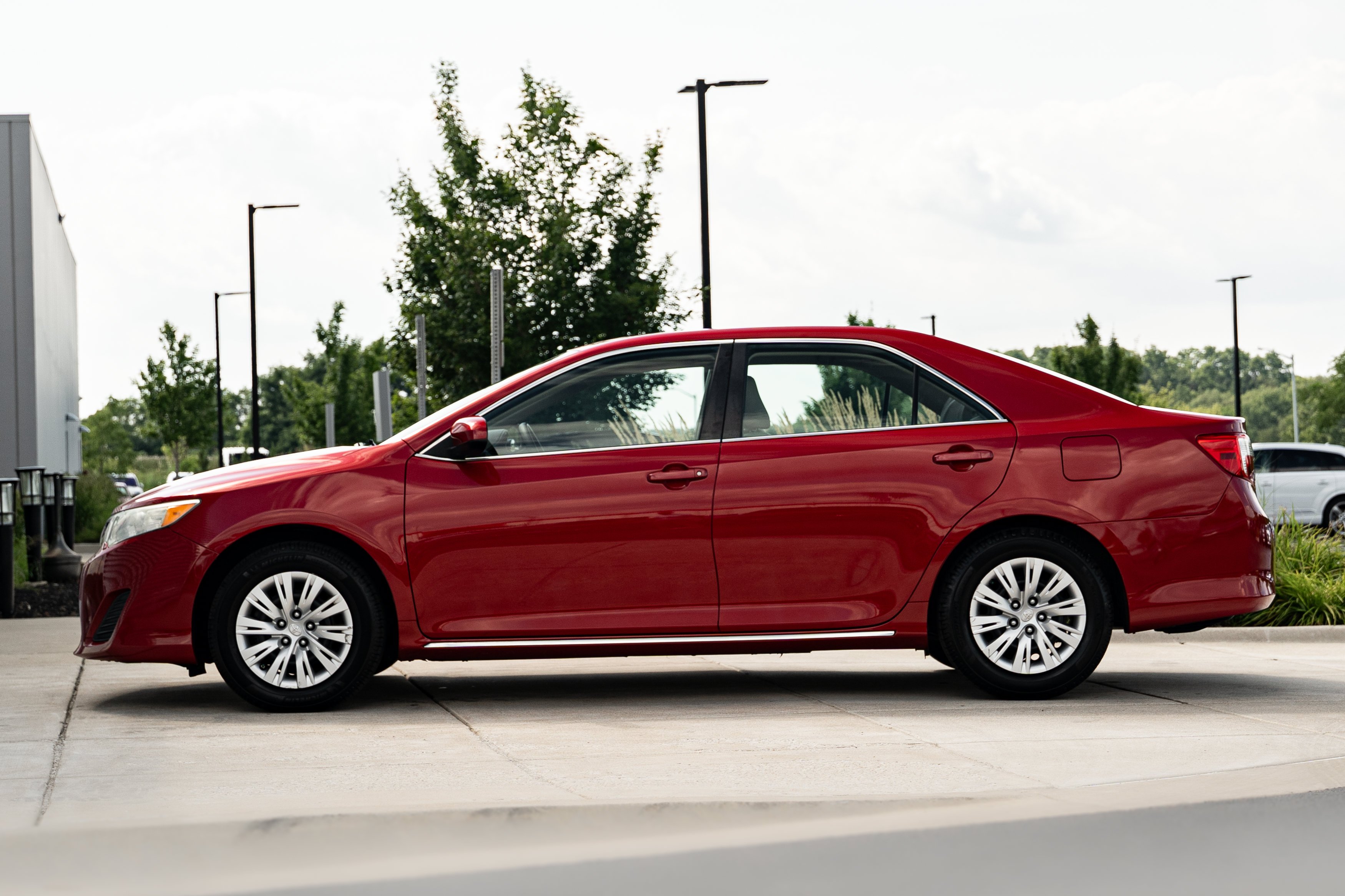 Used 2014 Barcelona Red Metallic Toyota LE image 6