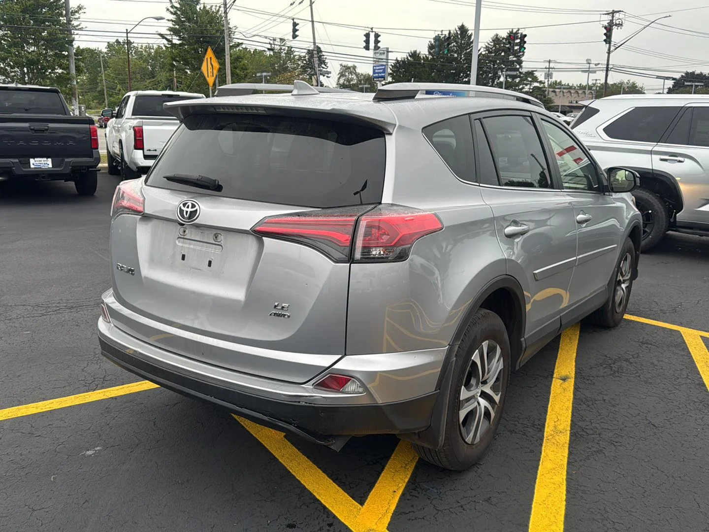 Used 2018 Silver Sky Metallic Toyota LE image 6